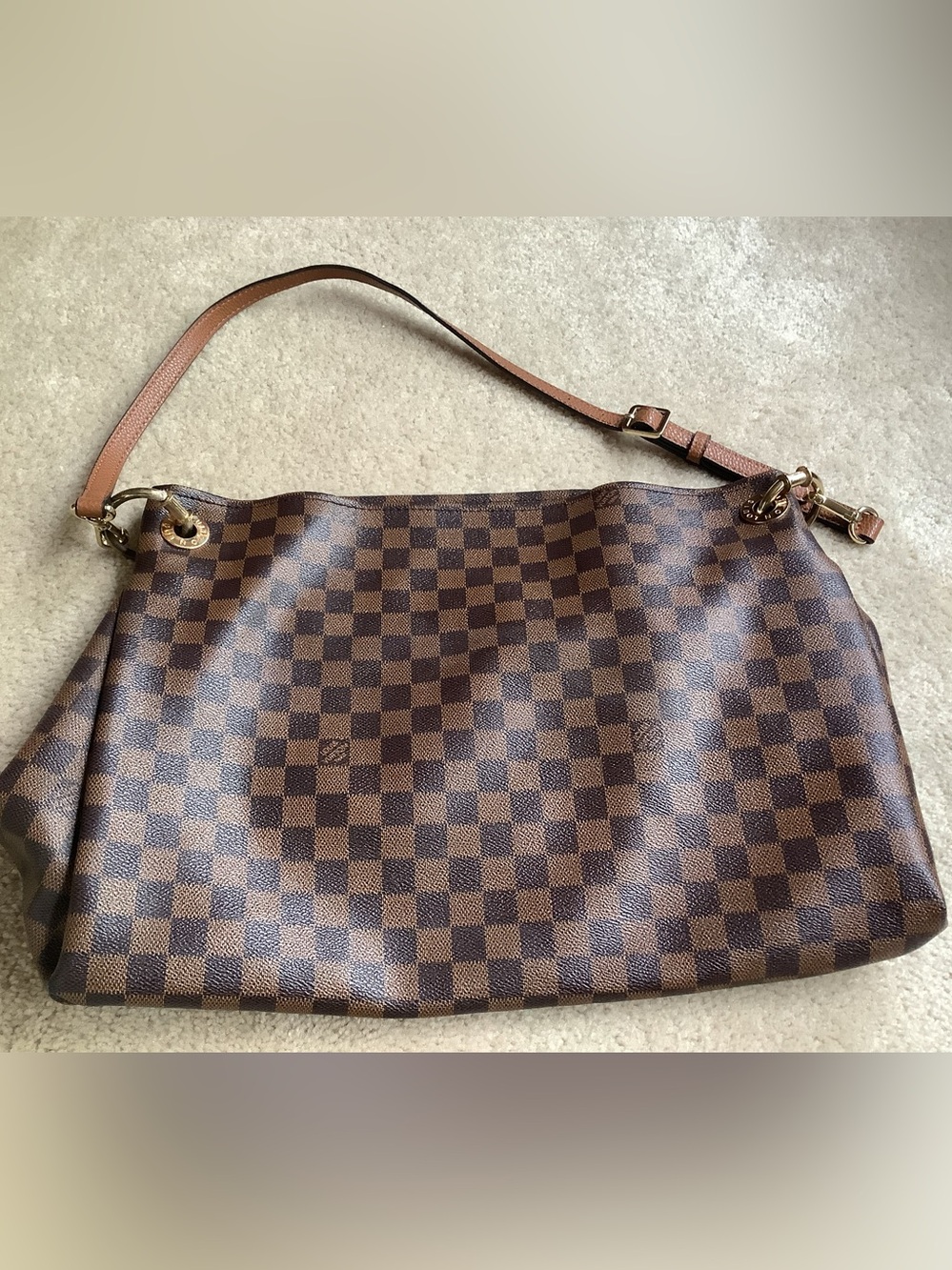 Large tote.  Replaced damaged handle/strap, signs of use inside and hardware